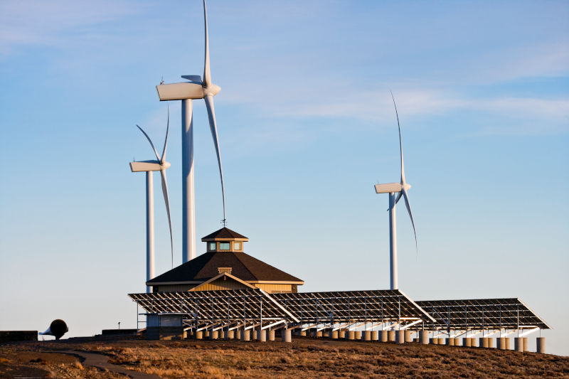 wind turbines and solar panels on rural land